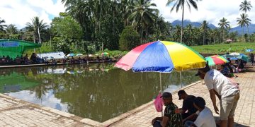 HUT Desa Ke-12, Pemdes Pinonobatuan Gelar Lomba Memancing