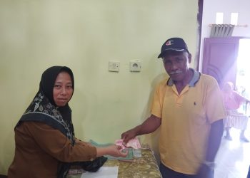 Pemdes Moyongkota Salurkan BLT DD Tahap III