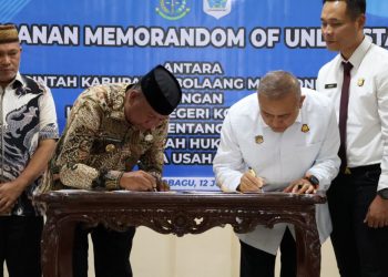 Bupati Oskar Tandatangani MOU Kerja Sama Hukum dengan Kejari Kotamobagu